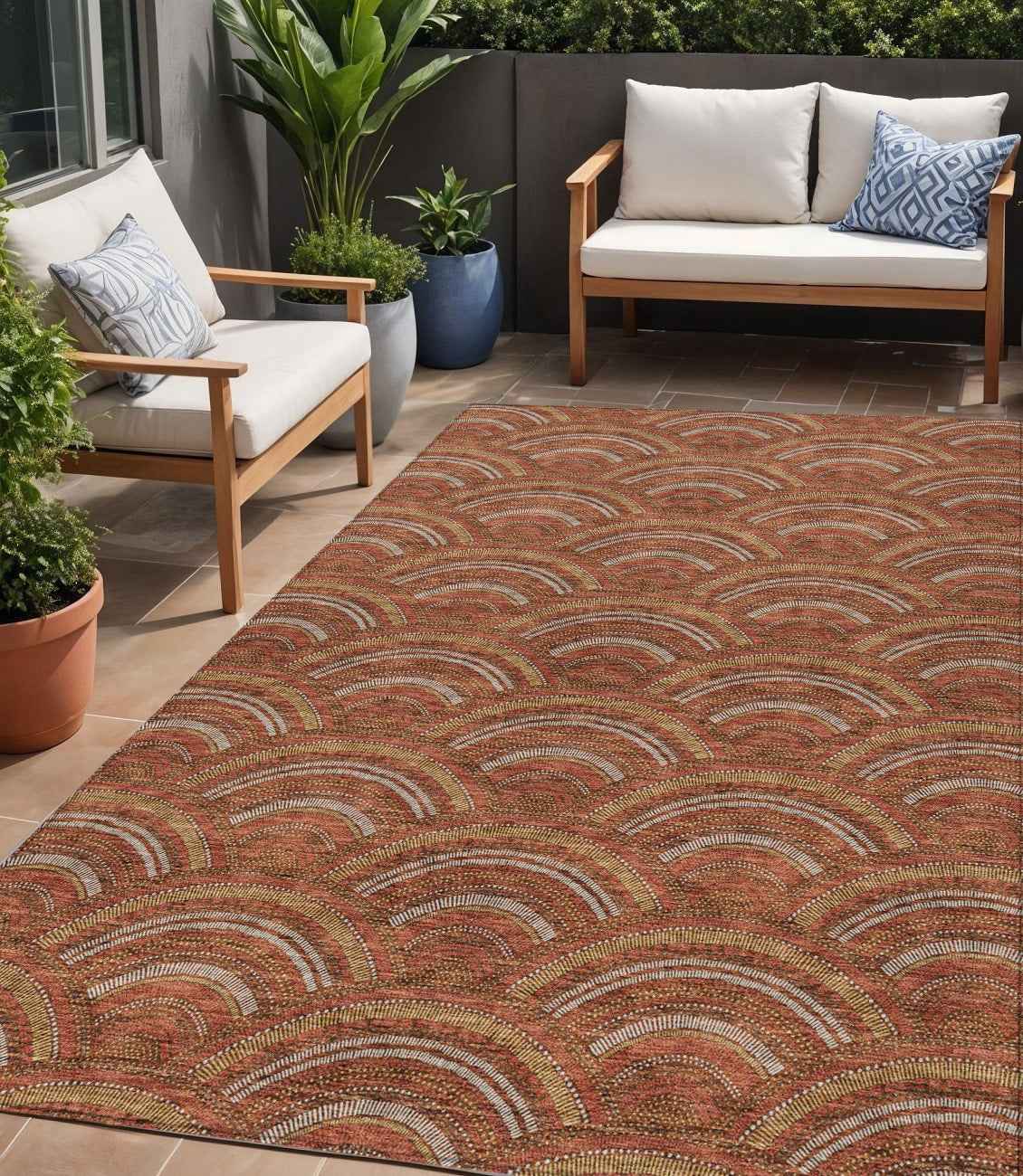 5' X 8' Orange Gold And Ivory Geometric Washable Indoor Outdoor Area Rug