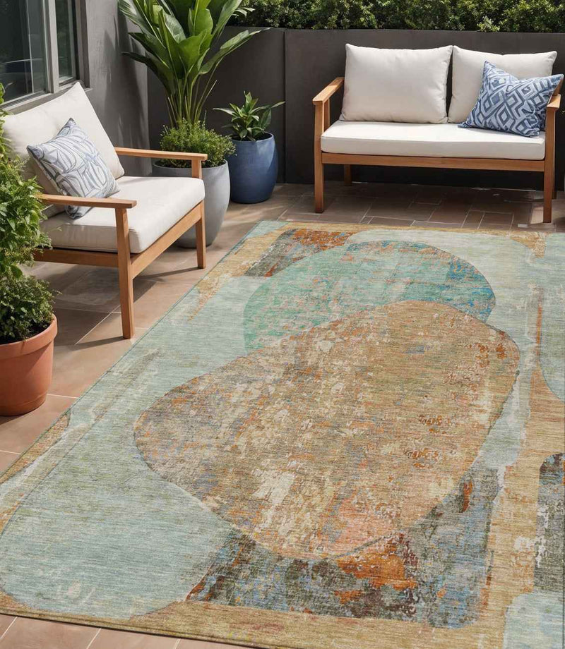 5' X 8' Teal Blue And Copper Abstract Washable Indoor Outdoor Area Rug
