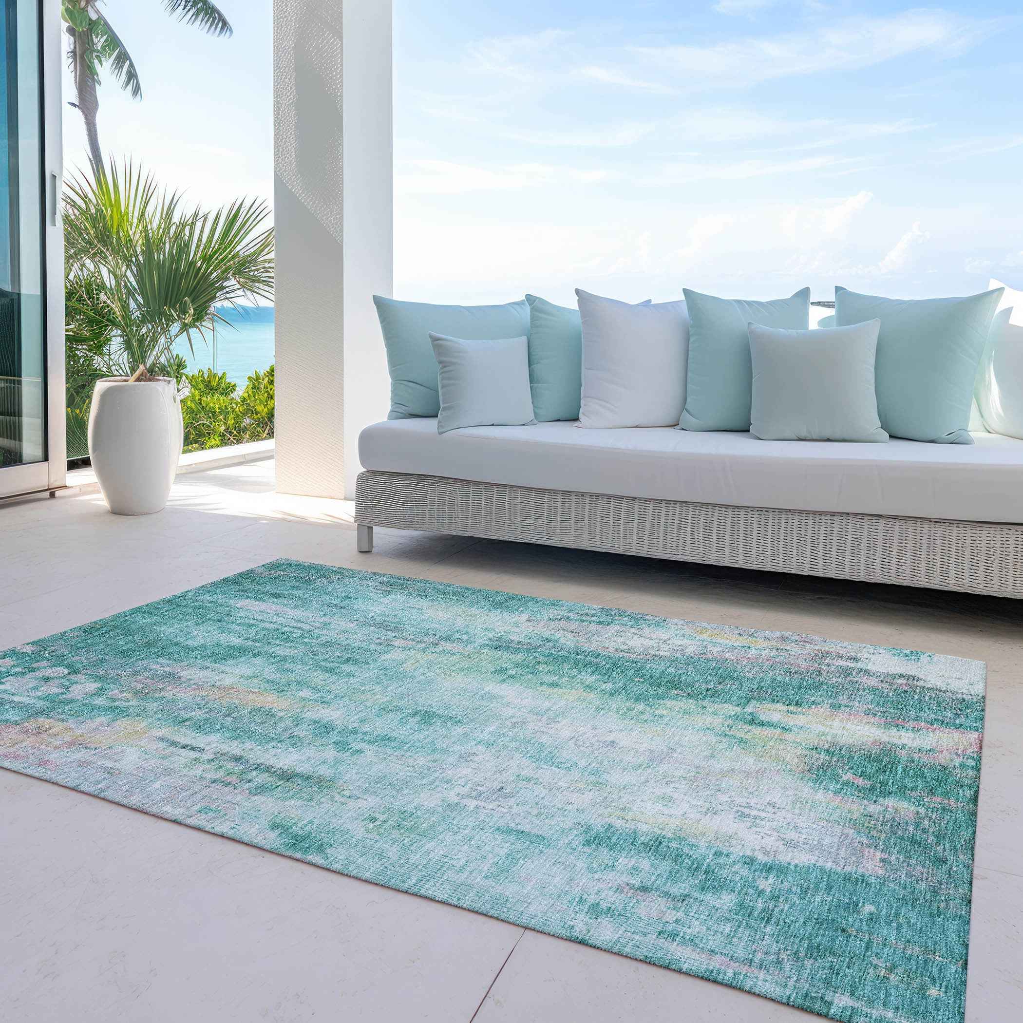 8' X 10' Teal Blue Peach And Ivory Abstract Washable Indoor Outdoor Area Rug