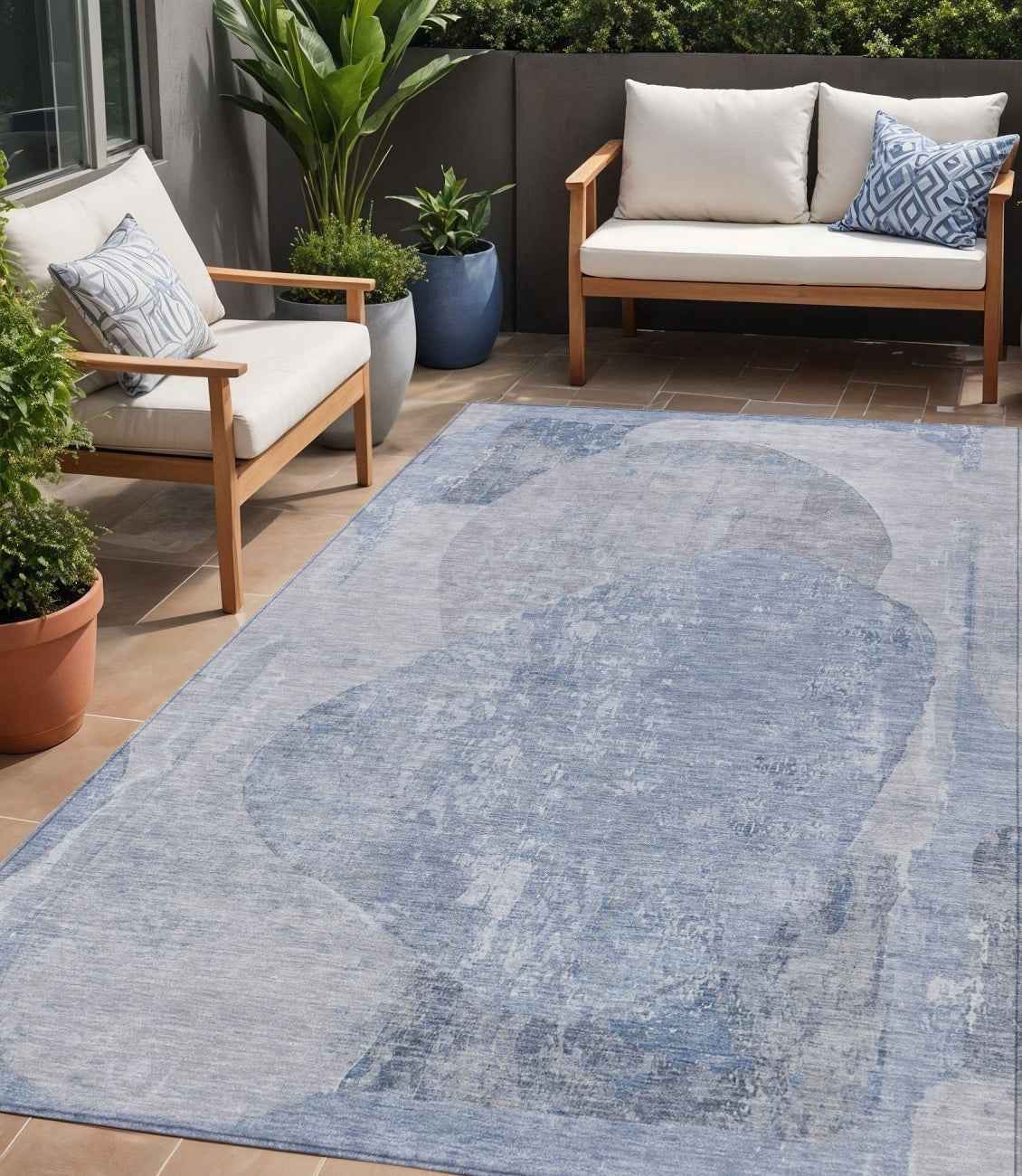 5' X 8' Sky Blue And Denim Blue Abstract Washable Indoor Outdoor Area Rug