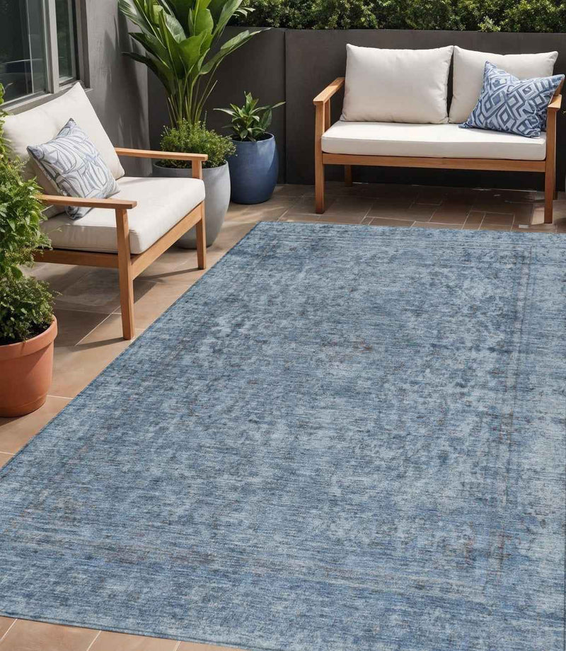 5' X 8' Blue And Beige Abstract Washable Indoor Outdoor Area Rug