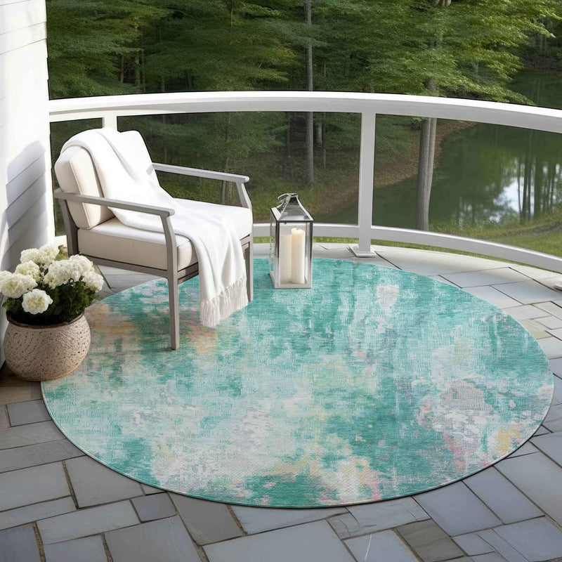 8' Teal Blue Peach And Ivory Round Abstract Washable Indoor Outdoor Area Rug