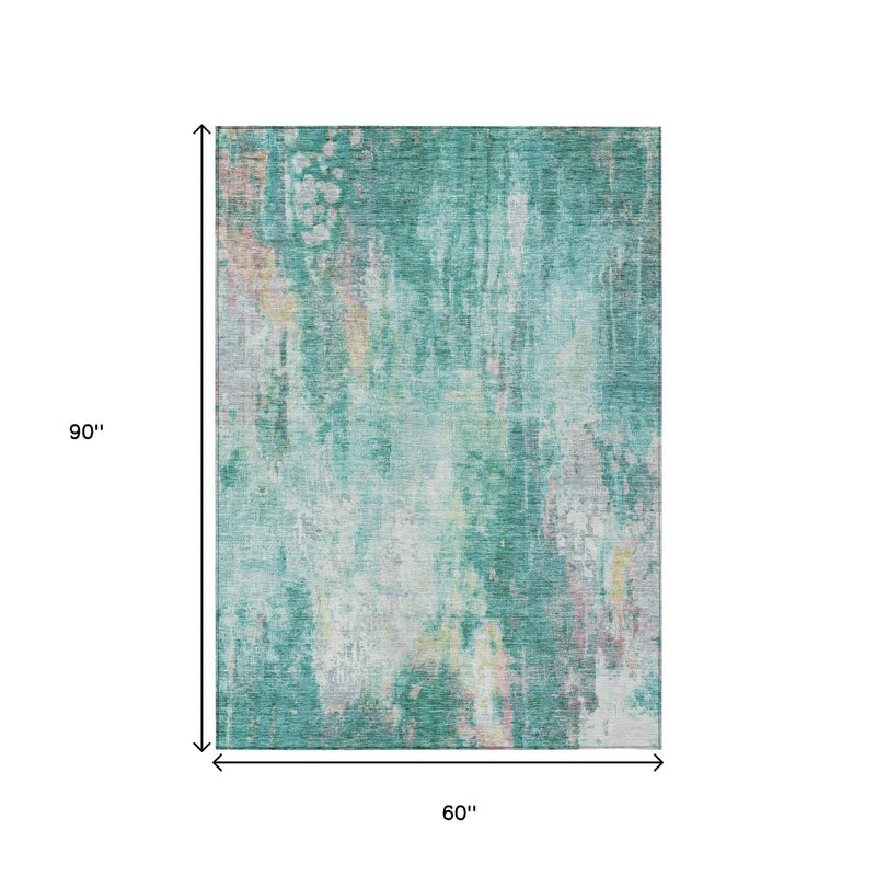 5' X 8' Teal Blue Peach And Ivory Abstract Washable Indoor Outdoor Area Rug