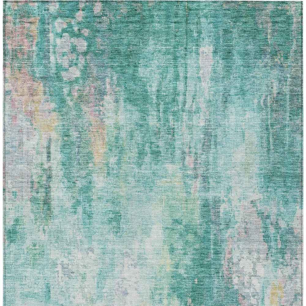 10' X 14' Teal Blue Peach And Ivory Abstract Washable Indoor Outdoor Area Rug