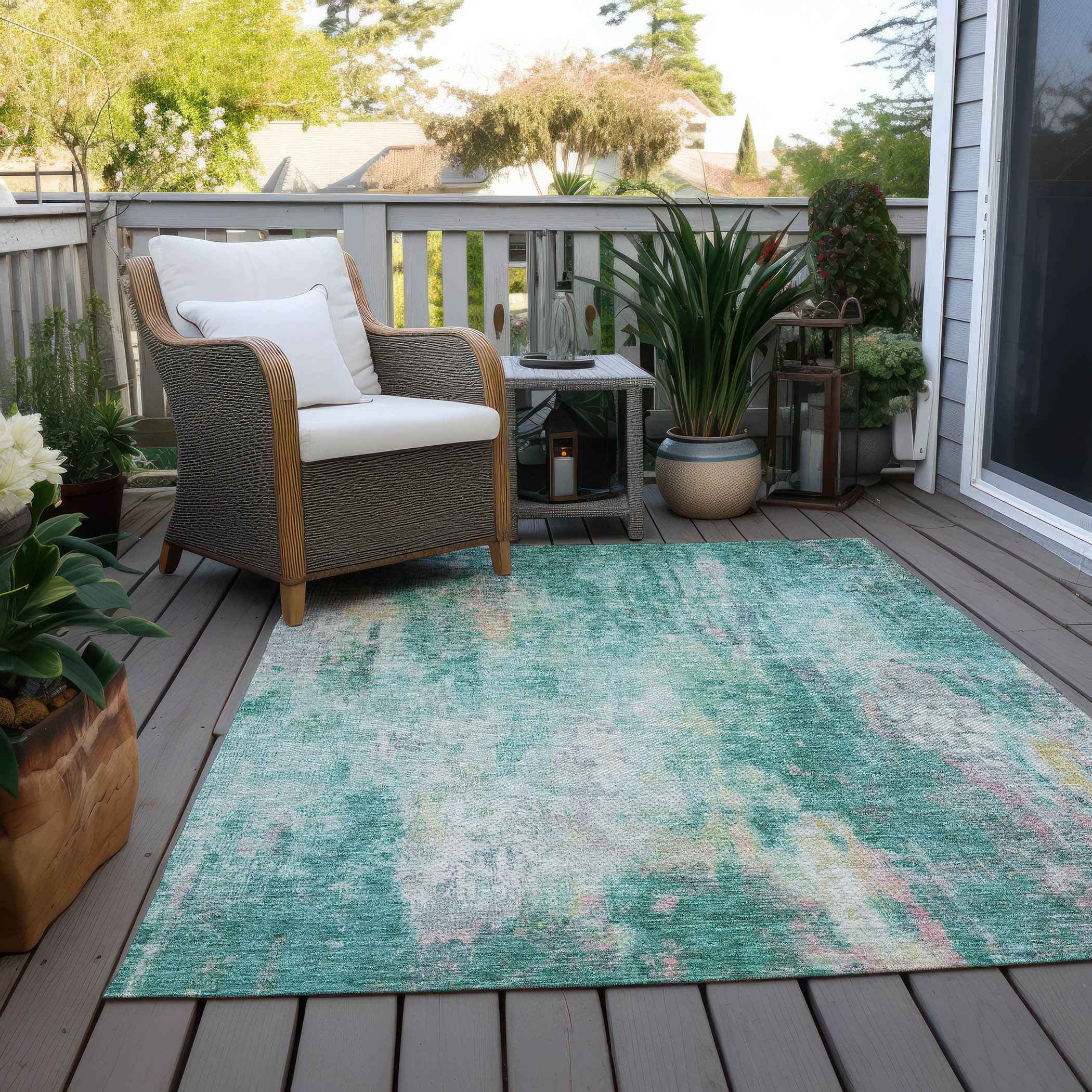 9' X 12' Teal Blue Peach And Ivory Abstract Washable Indoor Outdoor Area Rug