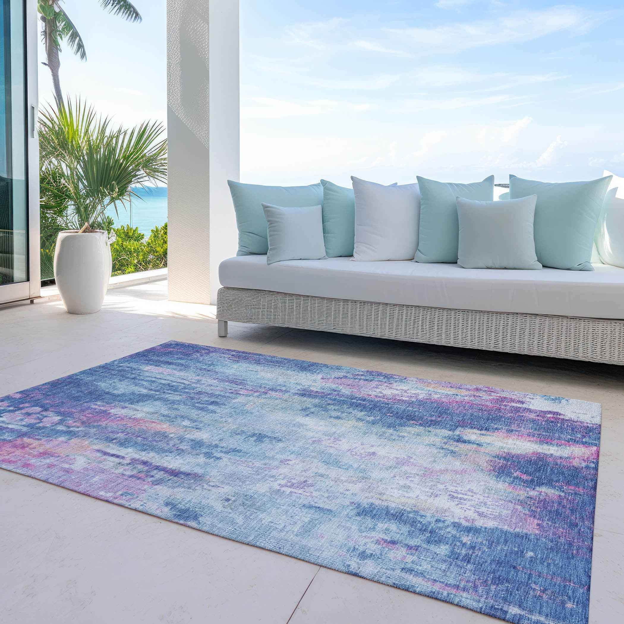 5' X 8' Blue Peach And Sky Blue Abstract Washable Indoor Outdoor Area Rug