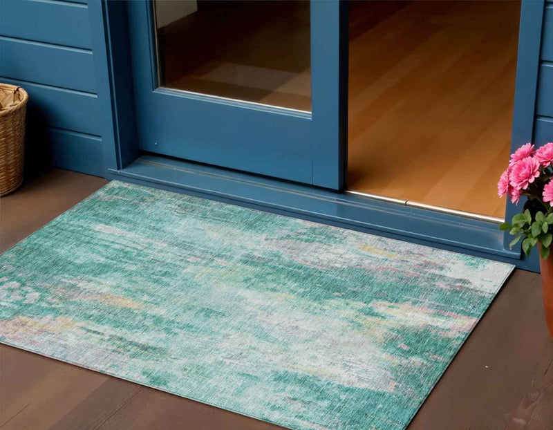 3' X 5' Teal Blue Peach And Ivory Abstract Washable Indoor Outdoor Area Rug