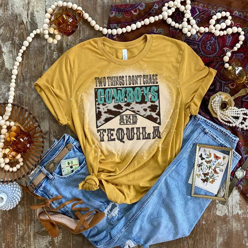 Mustard yellow graphic T-shirt reading Cowboys and Tequila, crew neck