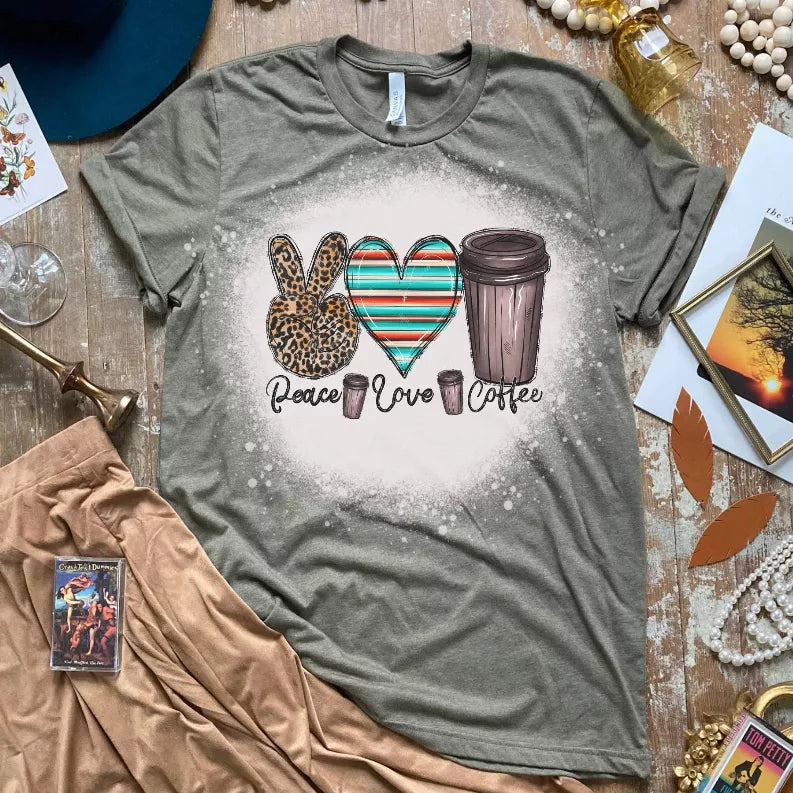 Grey crewneck short sleeve T-shirt with heart, leopard print, and Peace Love Coffee graphic