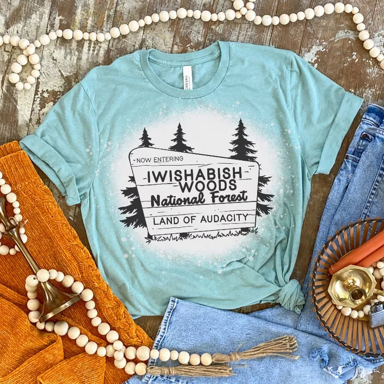 Light blue graphic crew-neck T-shirt with tree typography print, short sleeves