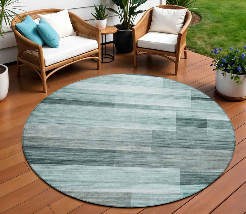 8' Teal Blue And Ivory Round Striped Washable Indoor Outdoor Area Rug