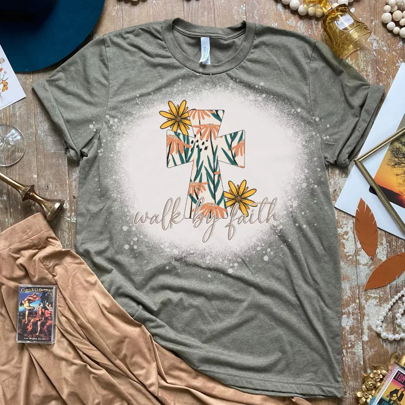 Heather green unisex short-sleeve T-shirt with floral burst graphic on front