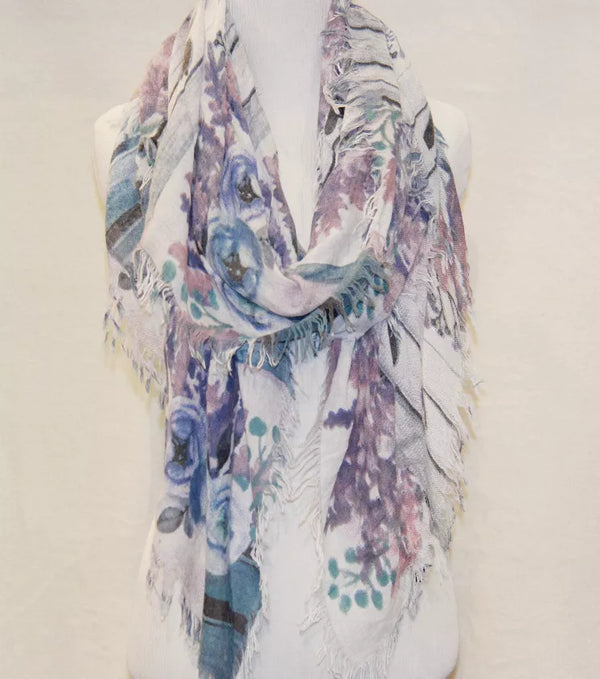 Pastel floral rose and lavender scarf with long fringe trim, draped at neckline