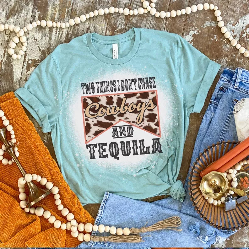 Teal crewneck short-sleeve T-shirt with 'Cowboys and Tequila' front graphic