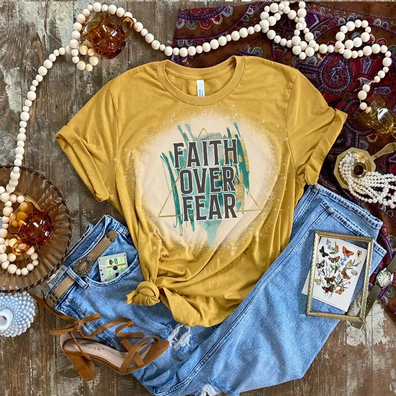 Mustard yellow short-sleeve T-shirt with 'Faith Over Fear' printed front