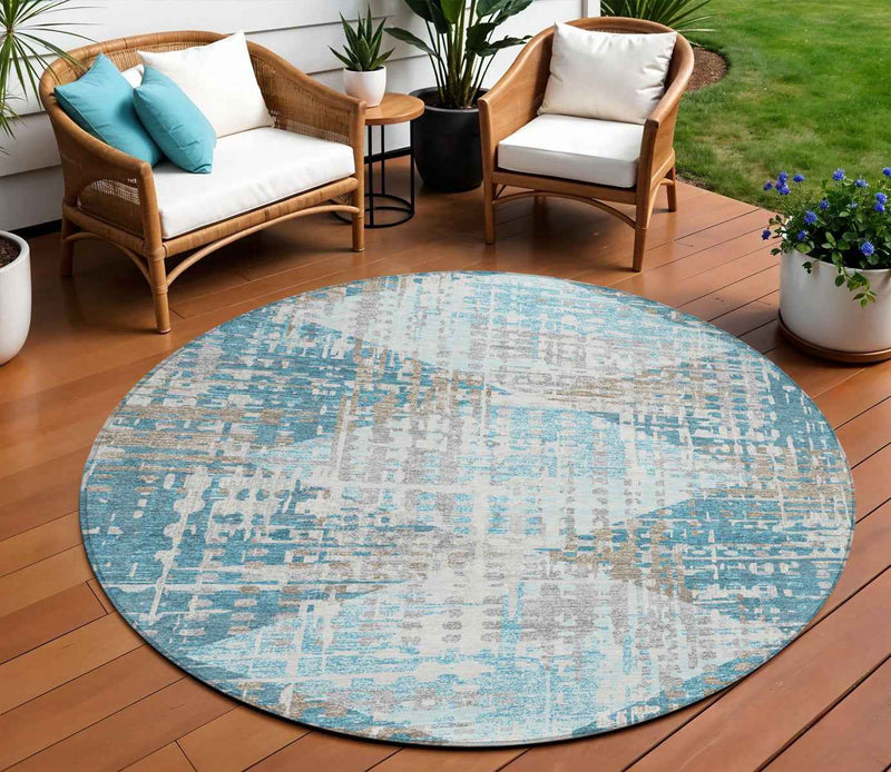 8' Teal Blue And Beige Round Geometric Washable Indoor Outdoor Area Rug