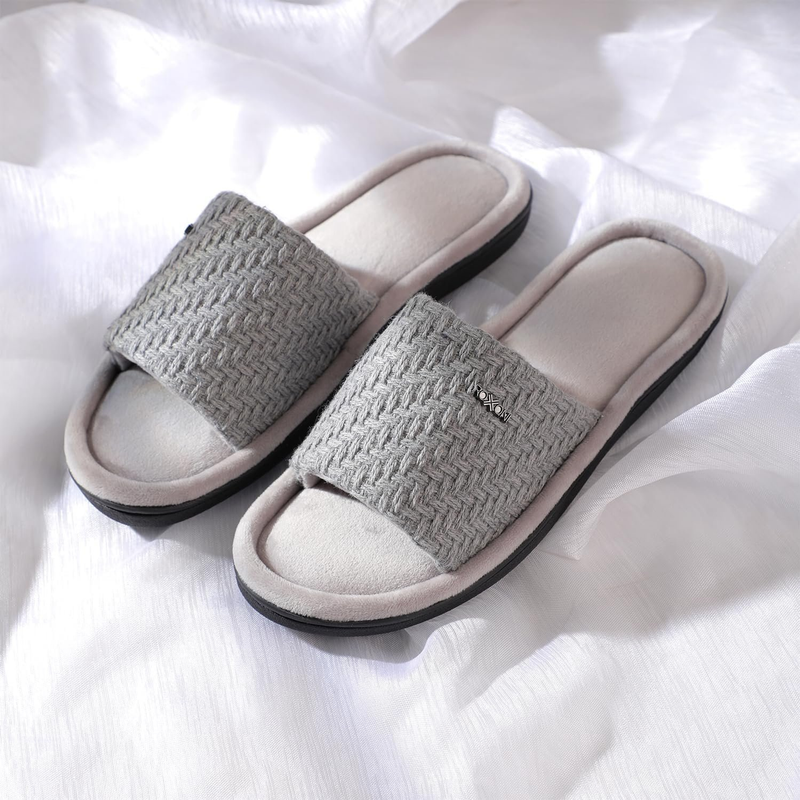 Women's gray woven slide sandals with open toe, textured upper, and black sole trim