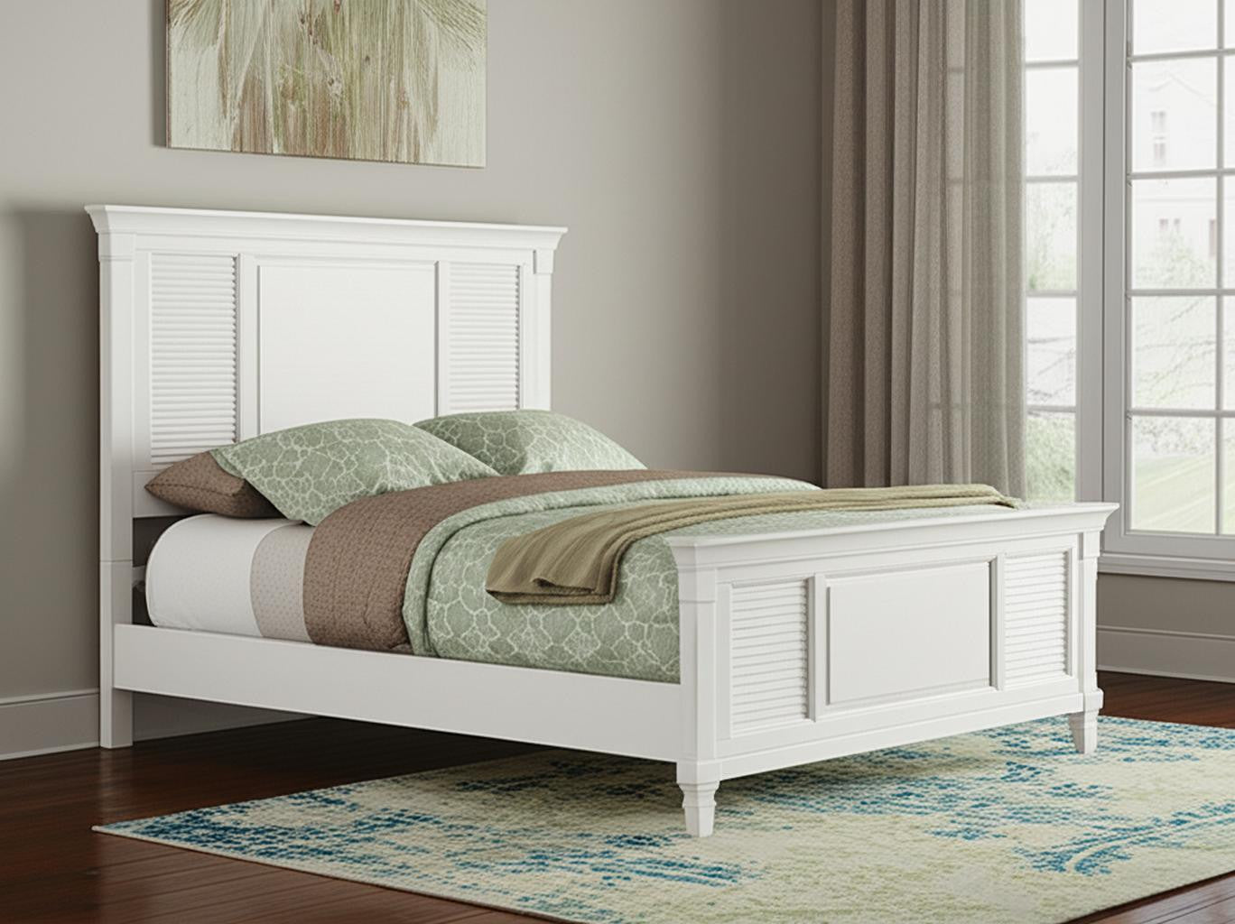 White wood bed frame with paneled headboard and low side rails, decorative molding.