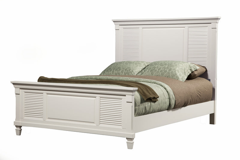 White king bed frame, paneled headboard and footboard with turned legs.