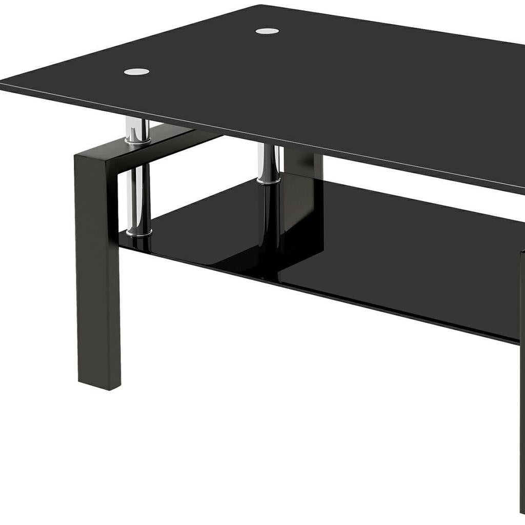 Black glass coffee table underside with chrome posts and glossy black support