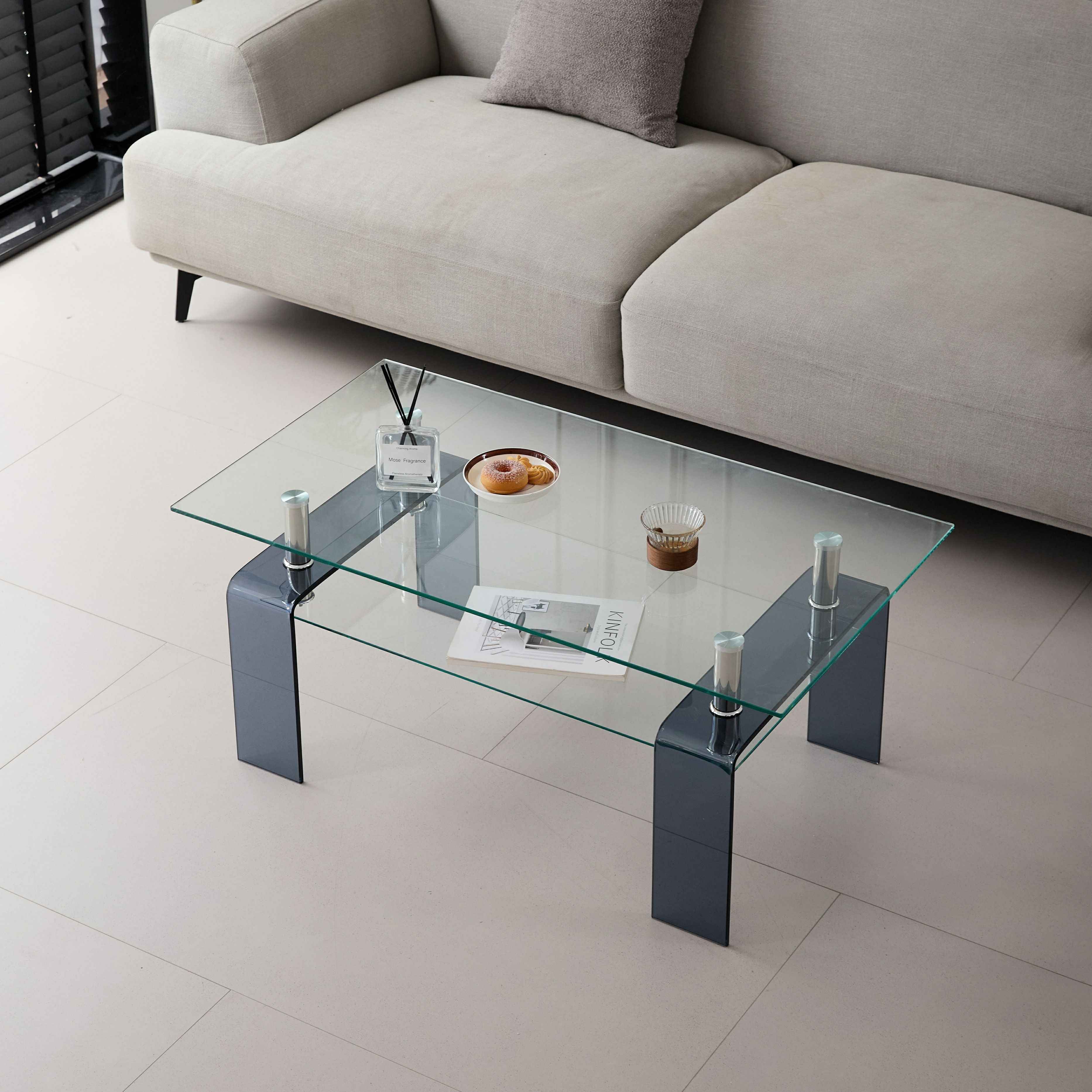 39" Clear and Black Glass Coffee Table With Shelf
