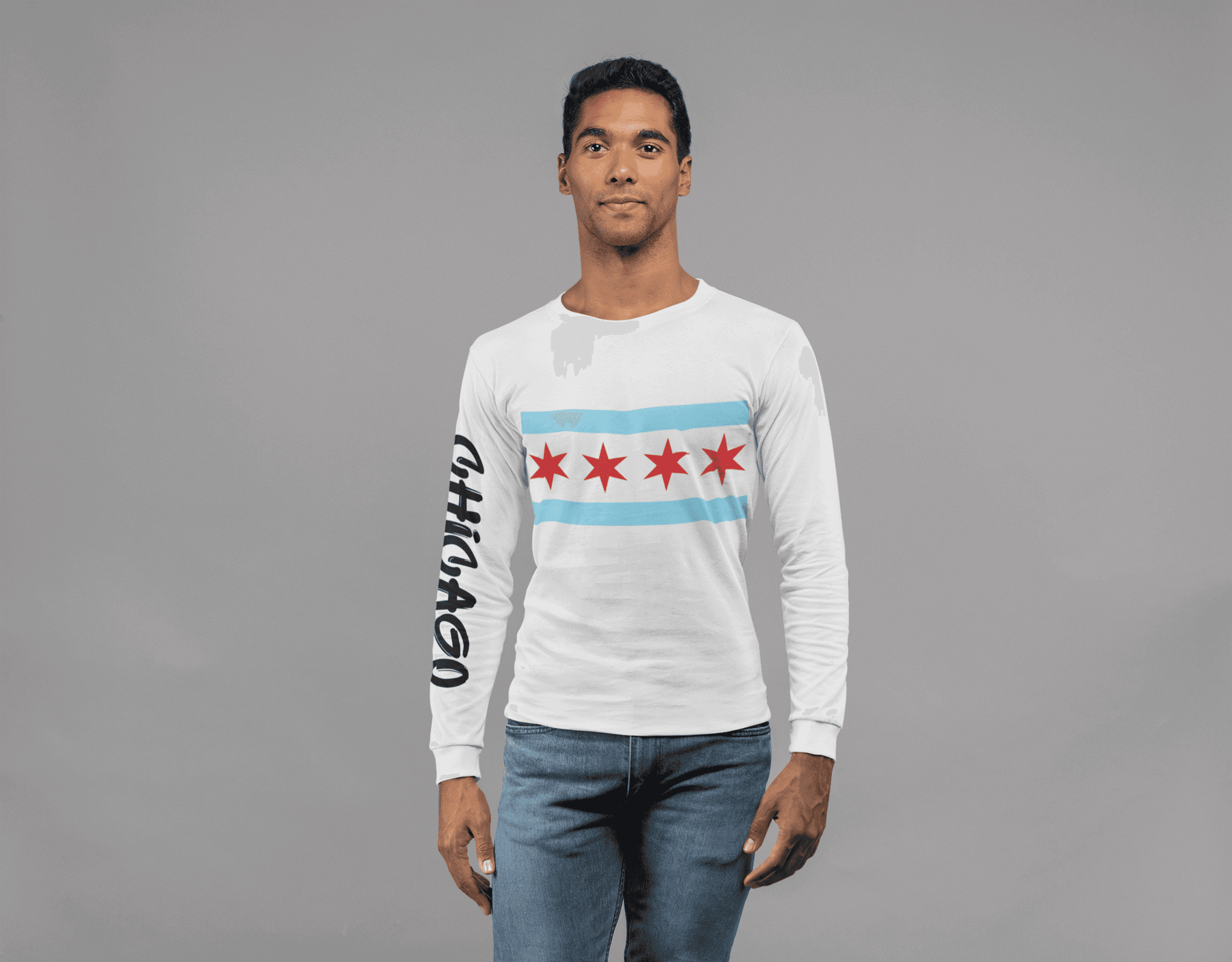 White crewneck sweatshirt with chest flag graphic and black graffiti text on left sleeve