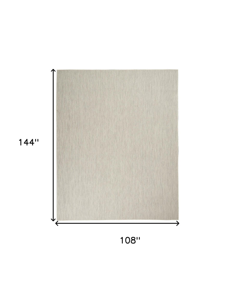 9x12 ft area rug, solid light ivory surface with subtle silver flecks, rectangular