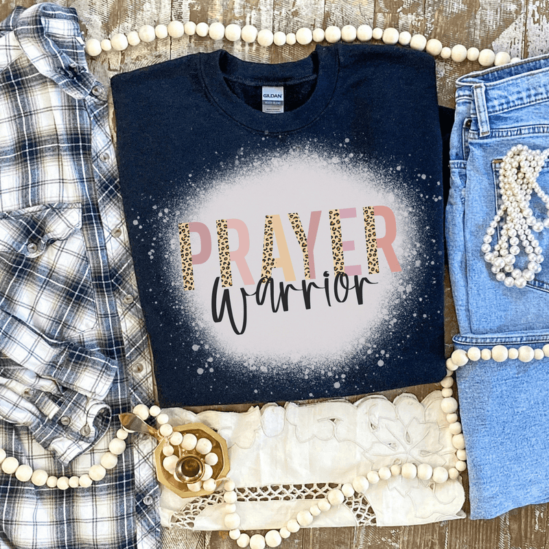 Dark navy bleached graphic T-shirt with PRAYER word art and circular splatter