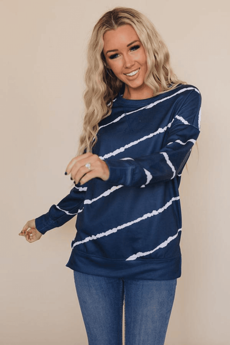 Navy tie-dye striped pullover with white wave lines, crew neck, long sleeves (front view)