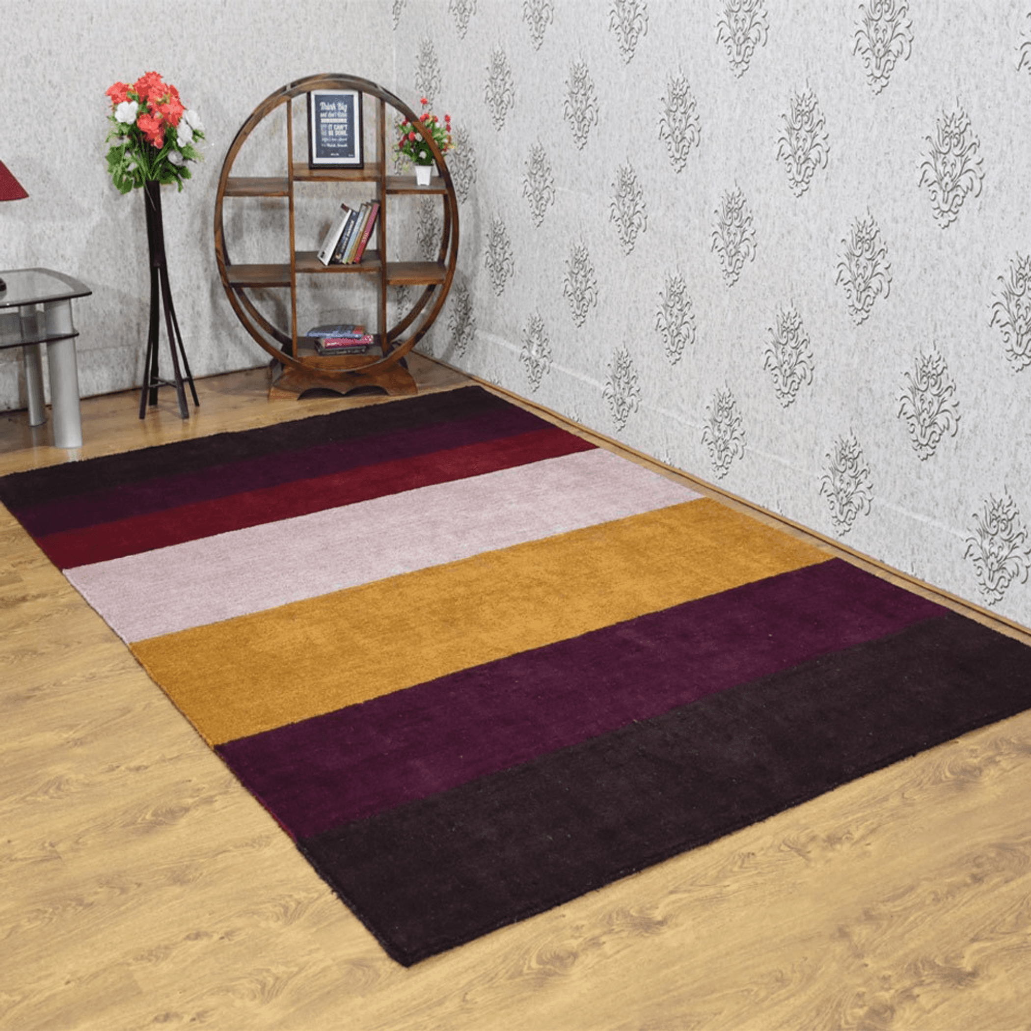 Hand-knotted area rug with stripe blocks in burgundy, cream, gold, and dark purple