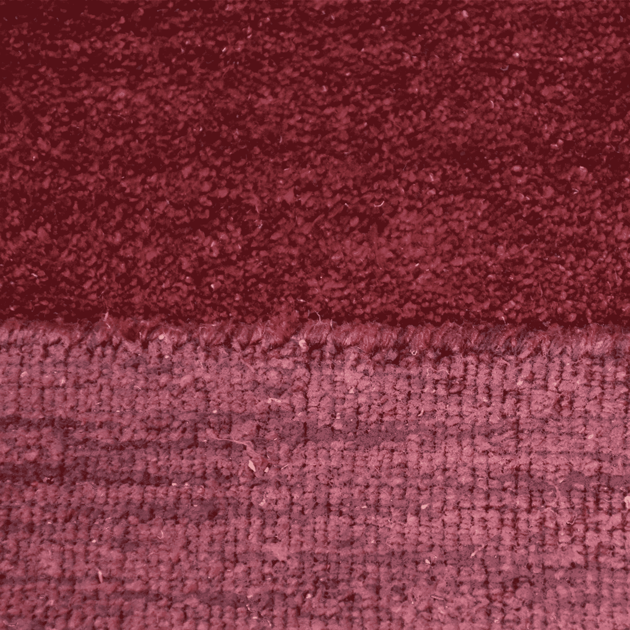 Hand-knotted silk mix area rug close-up, burgundy and pink plaid texture with fringe edge