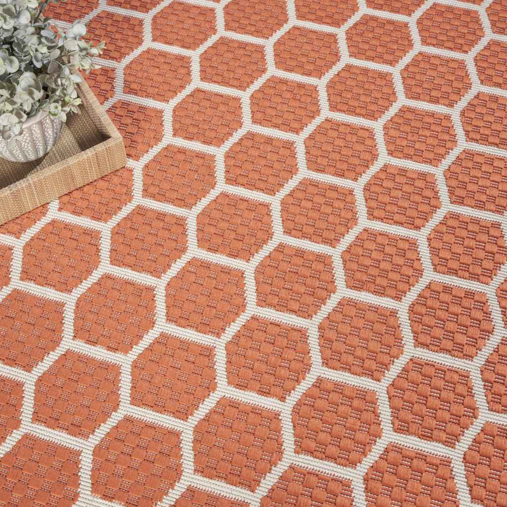 8' Coral And Ivory Geometric Indoor Outdoor Area Rug