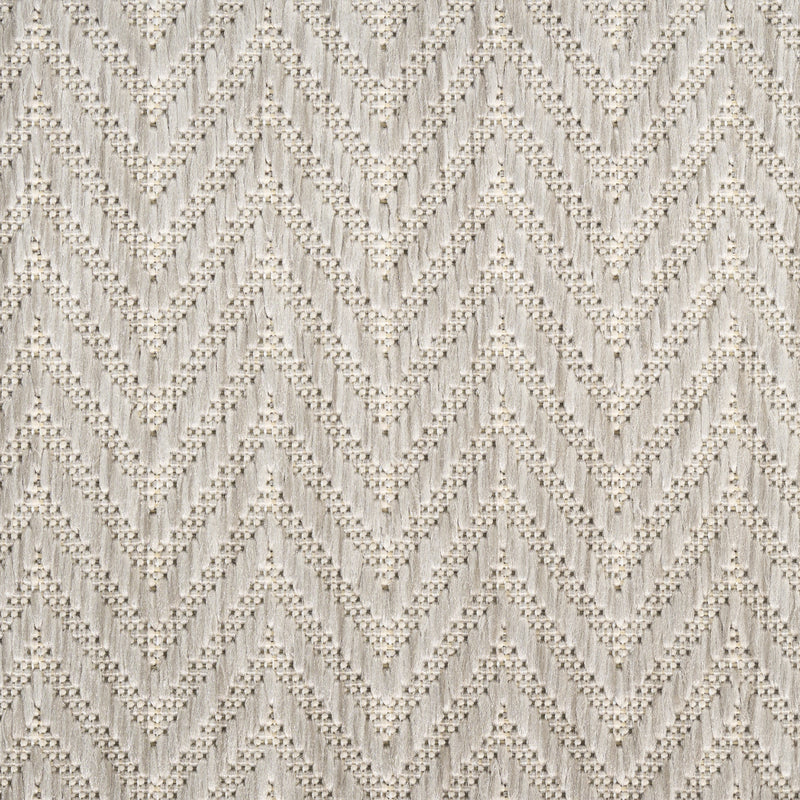 Light gray chevron zigzag area rug with speckled texture