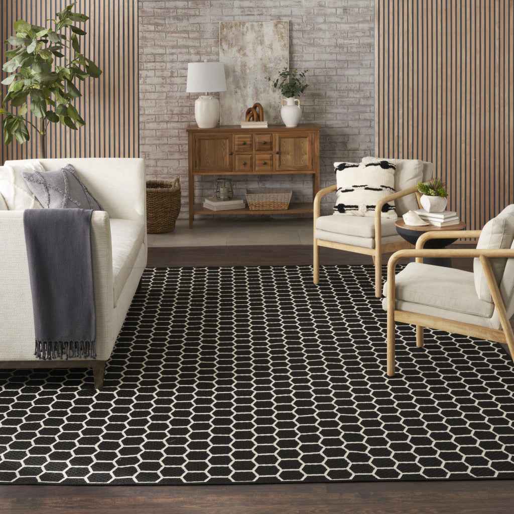 8' X 10' Black And Ivory Geometric Indoor Outdoor Area Rug