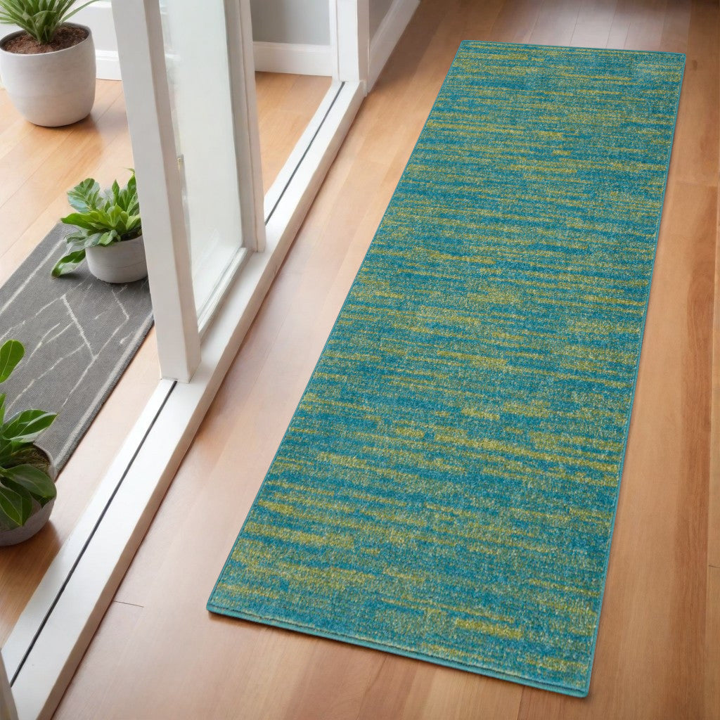 Vibrant teal and yellow indoor runner rug, made of soft, durable fibers, perfect for adding color to entryways.