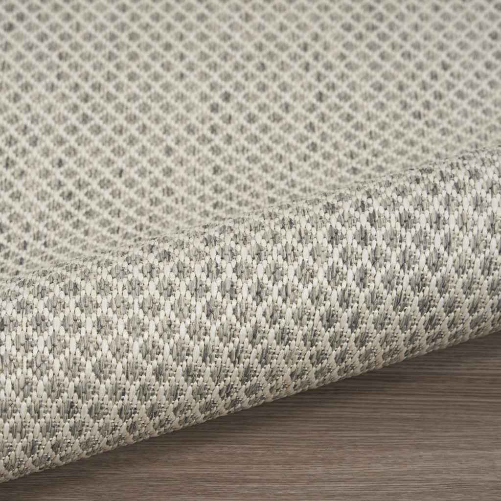9' X 12' Ivory And Silver Indoor Outdoor Area Rug