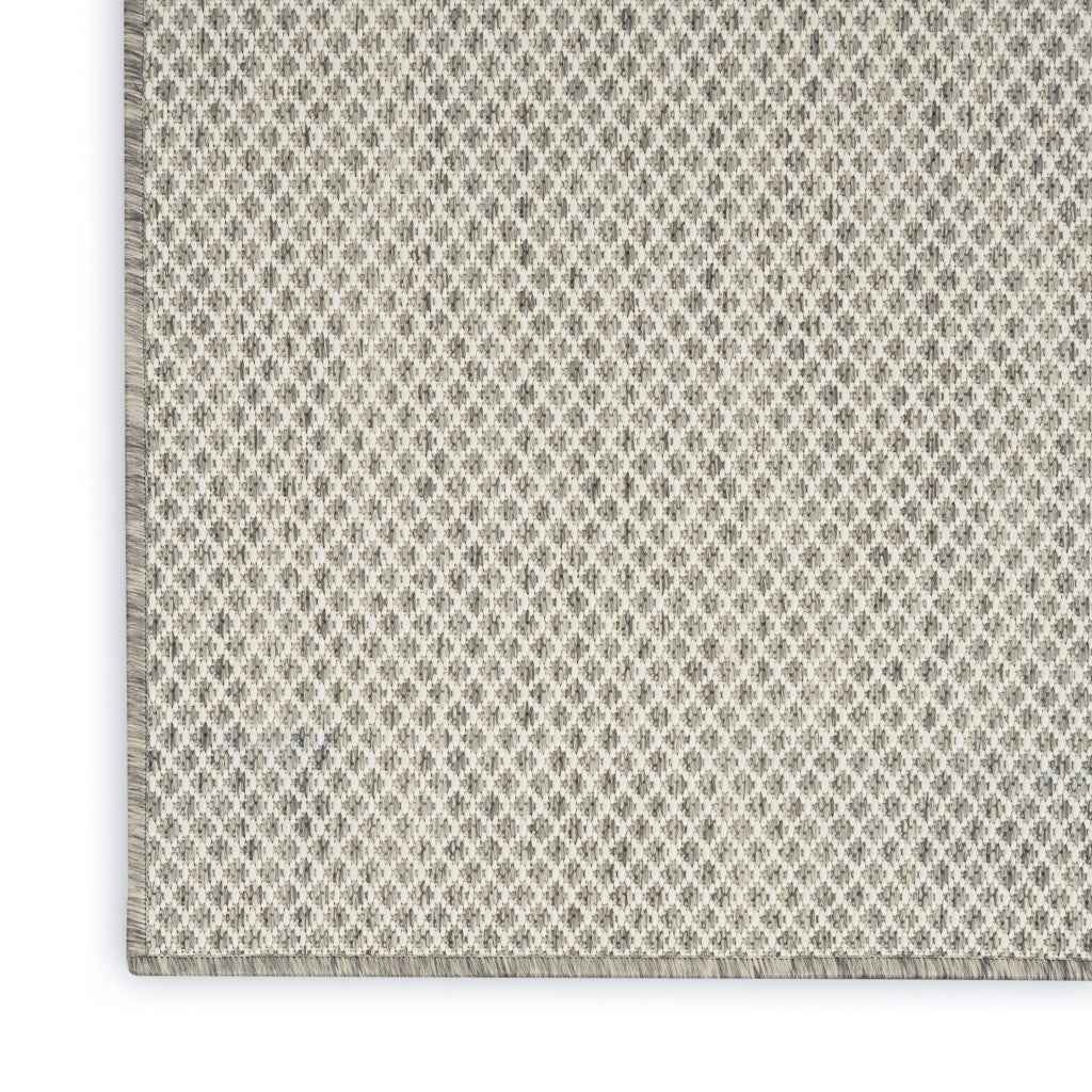 9' X 12' Ivory And Silver Indoor Outdoor Area Rug