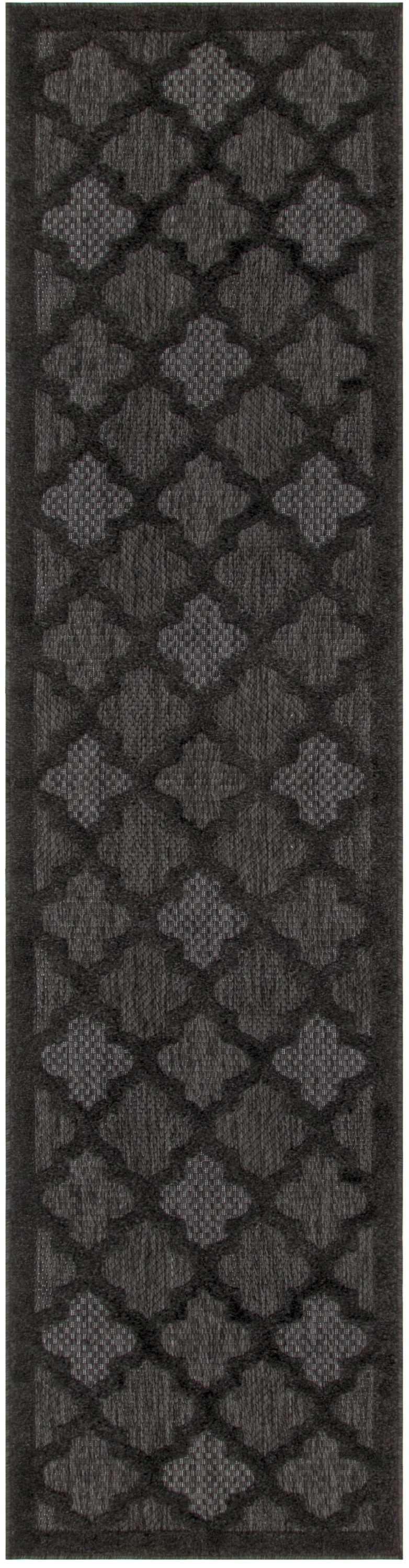 Charcoal and black trellis indoor outdoor runner rug end with dark quatrefoil pattern