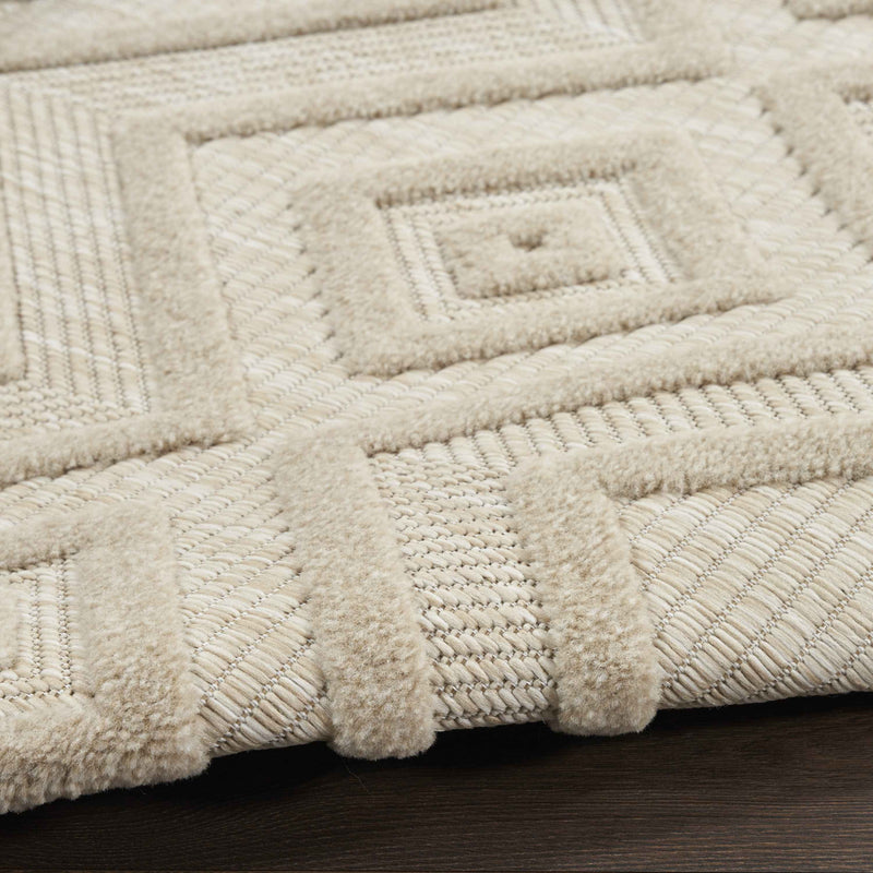 4' Cream And Beige Round Geometric Indoor Outdoor Area Rug