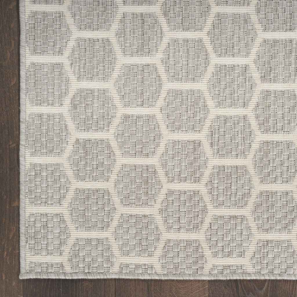 6' X 9' Gray And Ivory Geometric Indoor Outdoor Area Rug