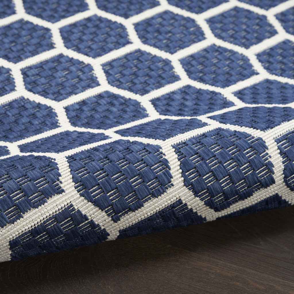 6' X 9' Navy Blue And Ivory Geometric Indoor Outdoor Area Rug