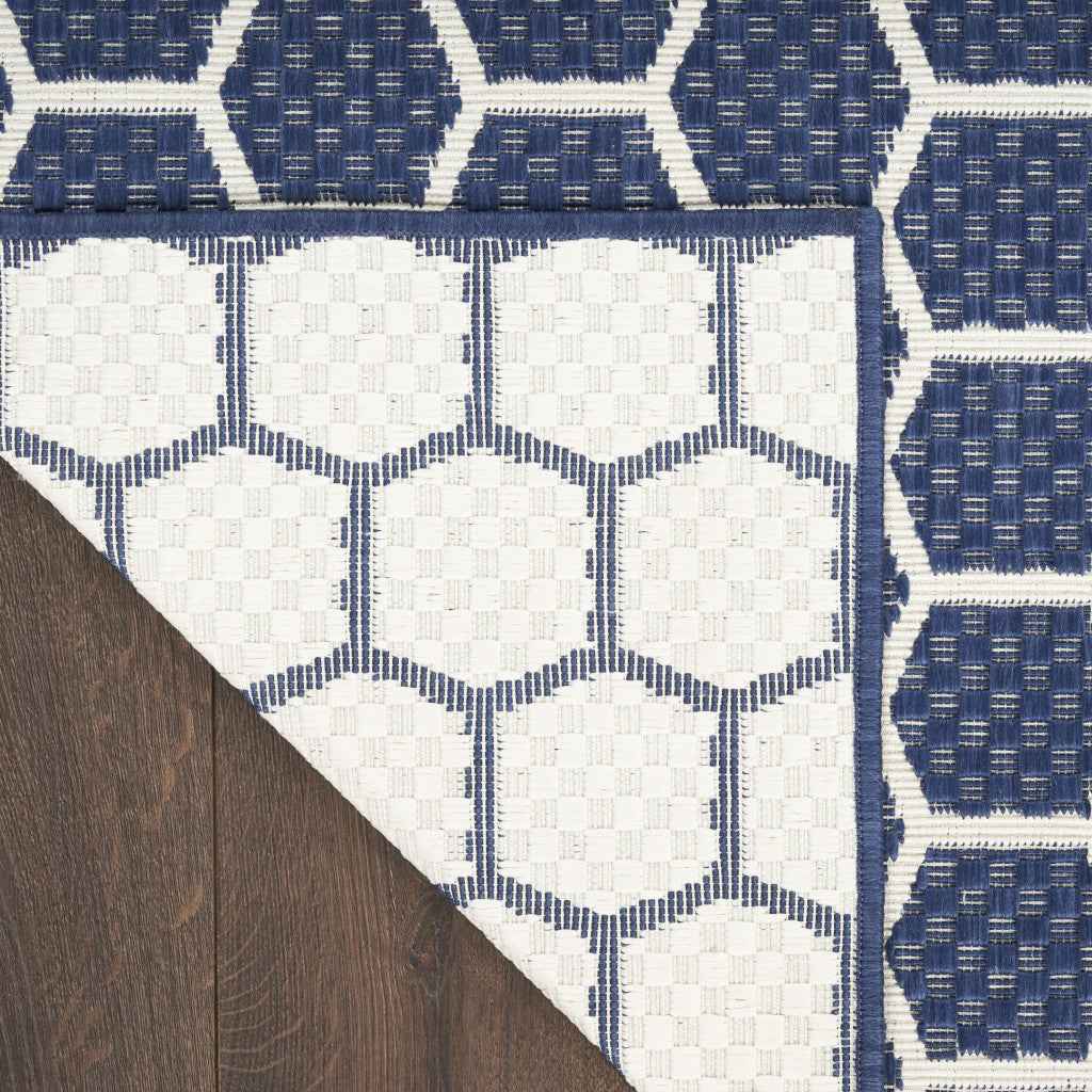 6' X 9' Navy Blue And Ivory Geometric Indoor Outdoor Area Rug