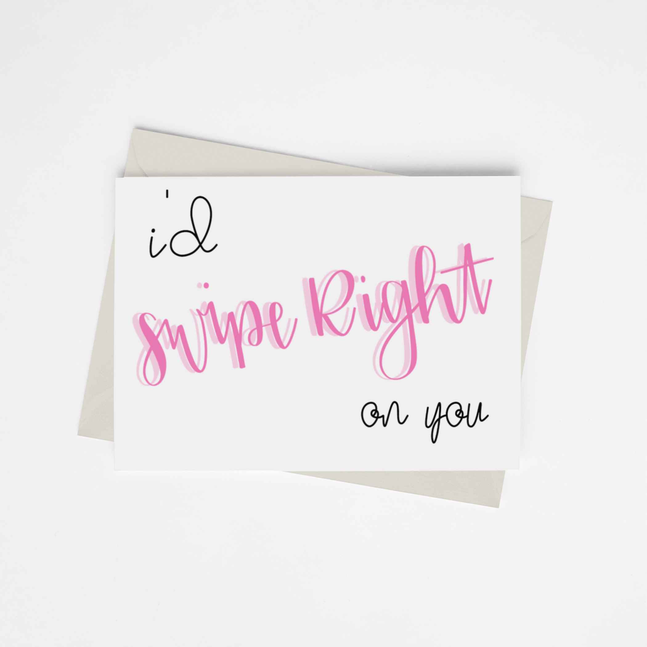 Greeting card with pink cursive “Swipe Right on you” and black “I’d” heart, with envelope