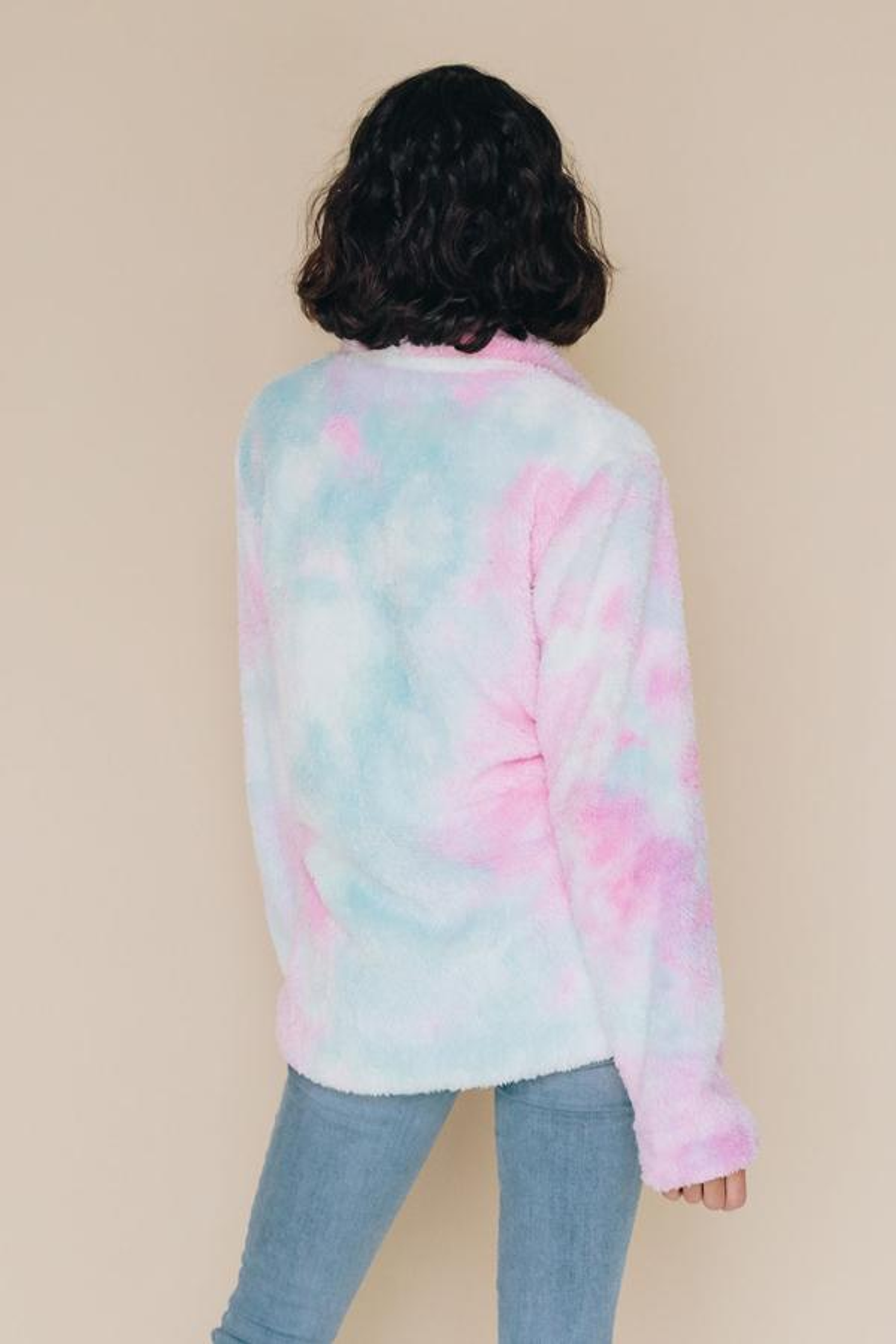 Tie-dye fleece coat with hood, long sleeves, back view in pastel pink and blue