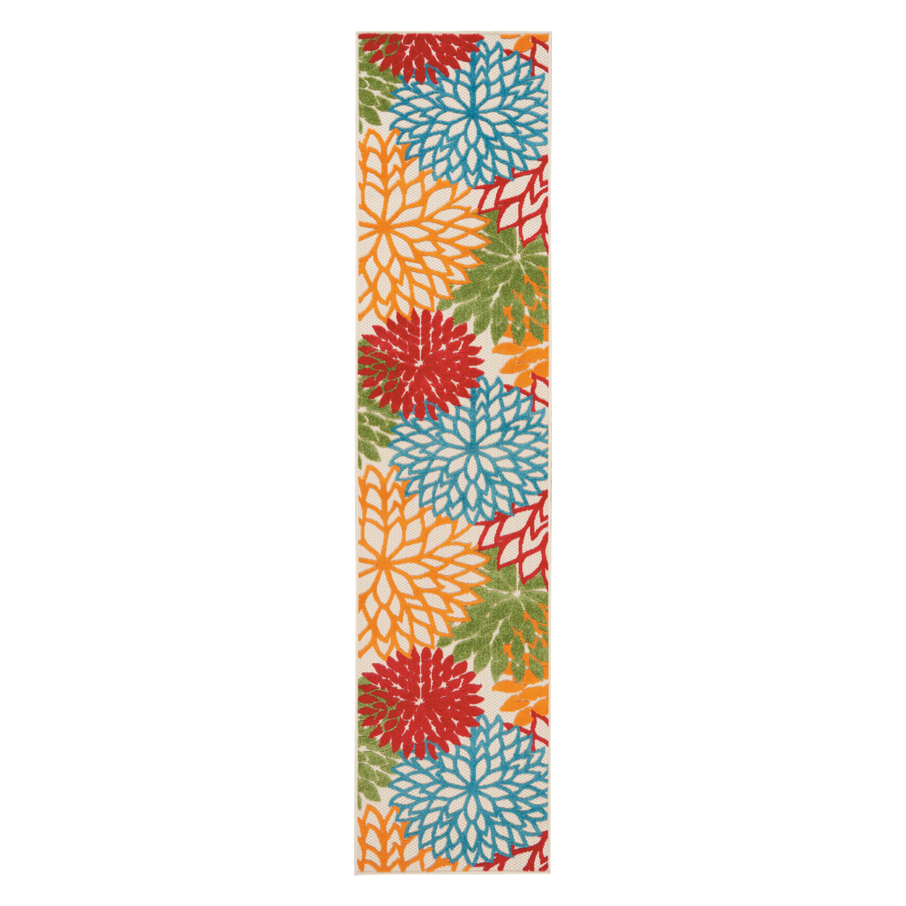 Vertical floral runner rug, orange with blue, green, and red leaf motifs on ivory ground