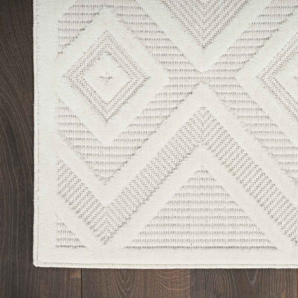 3' X 5' Ivory And White Geometric Indoor Outdoor Area Rug