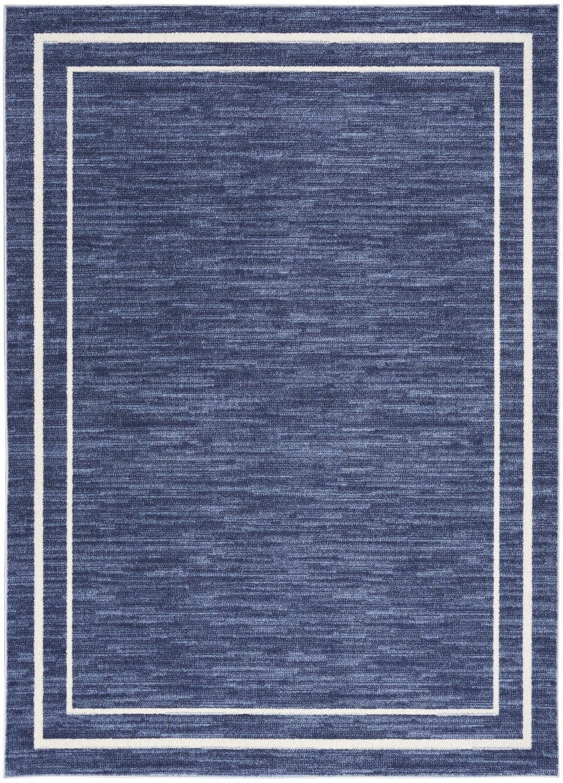 Navy square area rug with ivory layered border lines, flatweave texture