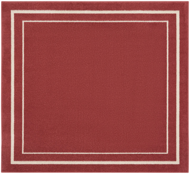 Red square rug with centered ivory nested rectangle border