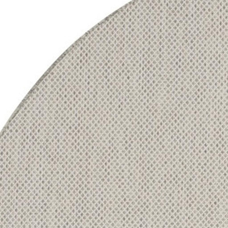 Close-up of ivory rug surface with silver-tone geometric lattice pattern texture