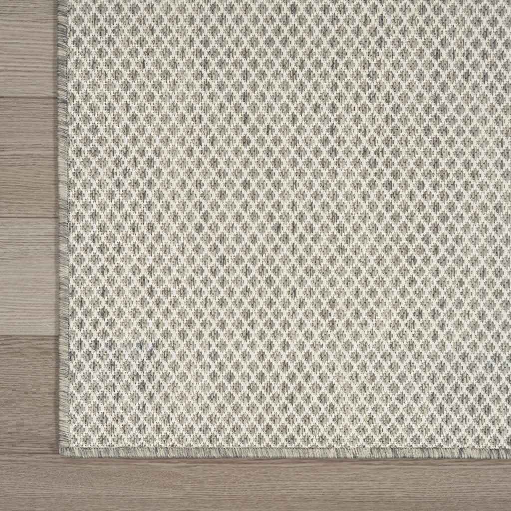 9' X 12' Ivory And Silver Indoor Outdoor Area Rug